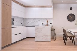 kitchen-with-dining-area-and-wall-clock