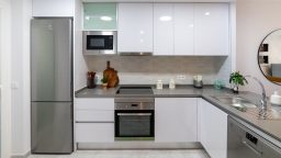 fitted-kitchen-with-oven-and-fridge-freezer